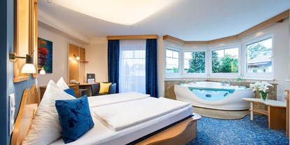 Stadthotels - Flughafen - Salzburg - Exklusivzimmer Neptun mit Wasserbett und Whrilwanne - Hotel Himmelreich