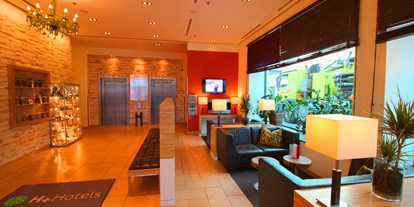 Stadthotels - Klassifizierung: 4 Sterne - moderne Lobby - H+ Hotel Salzburg