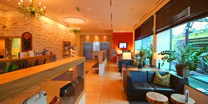 Stadthotels - Restaurant - Salzburg-Stadt Elisabeth-Vorstadt - Lobby mit gemütlicher Sitzmöglichkeit - H+ Hotel Salzburg