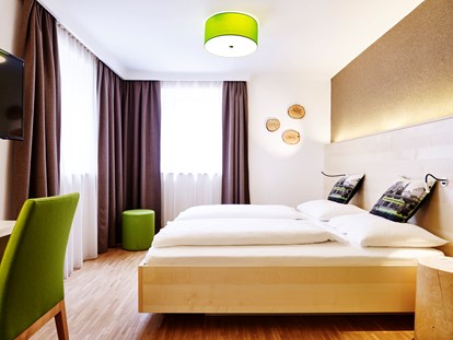 Stadthotels - Parkplatz: kostenlos beim Hotel - Österreich - Doppelzimmer Superior - Gartenhaus - Das Grüne Hotel zur Post - 100% BIO