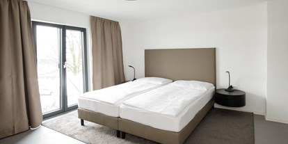 Stadthotels - WLAN - Bester Schlafkomfort in den B(l)ackhome City Apartments Salzburg - B(l)ackhome City Hotel Salzburg