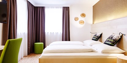 Stadthotels - barrierefrei - Österreich - Doppelzimmer Superior - Gartenhaus - Das Grüne Hotel zur Post - 100% BIO