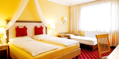 Stadthotels - Preisniveau: günstig - Österreich - Doppelzimmer Deluxe - für 3 Personen  - Das Grüne Hotel zur Post - 100% BIO