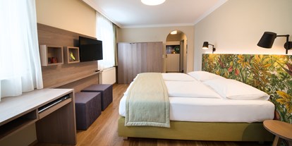 Stadthotels - Preisniveau: günstig - Österreich - Doppelzimmer Deluxe - Das Grüne Hotel zur Post - 100% BIO