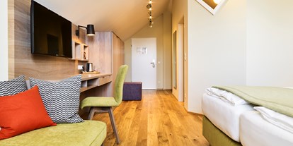 Stadthotels - Doppelzimmer Deluxe - Das Grüne Hotel zur Post - 100% BIO