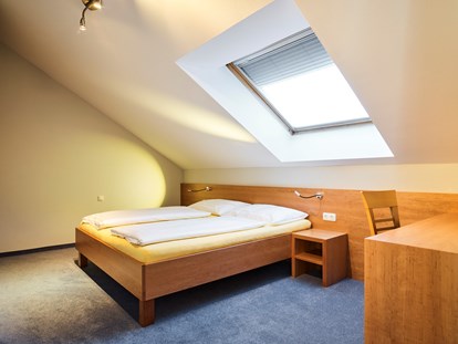 Stadthotels - Preisniveau: günstig - Salzburg-Stadt Maxglan - Schlafzimmer - Penthouse mit Terrasse - Das Grüne Hotel zur Post - 100% BIO