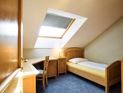 Stadthotels - barrierefrei - PLZ 5020 (Österreich) - Schlafzimmer - Penthouse mit Terrasse - Das Grüne Hotel zur Post - 100% BIO