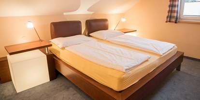 Stadthotels - barrierefrei - Österreich - Schlafzimmer - Penthouse mit Terrasse - Das Grüne Hotel zur Post - 100% BIO