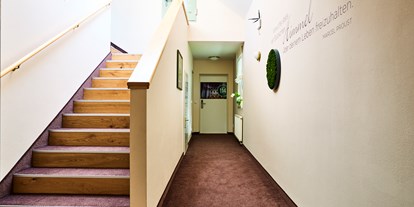 Stadthotels - Aufgang zu den Zimmern - Das Grüne Hotel zur Post - 100% BIO