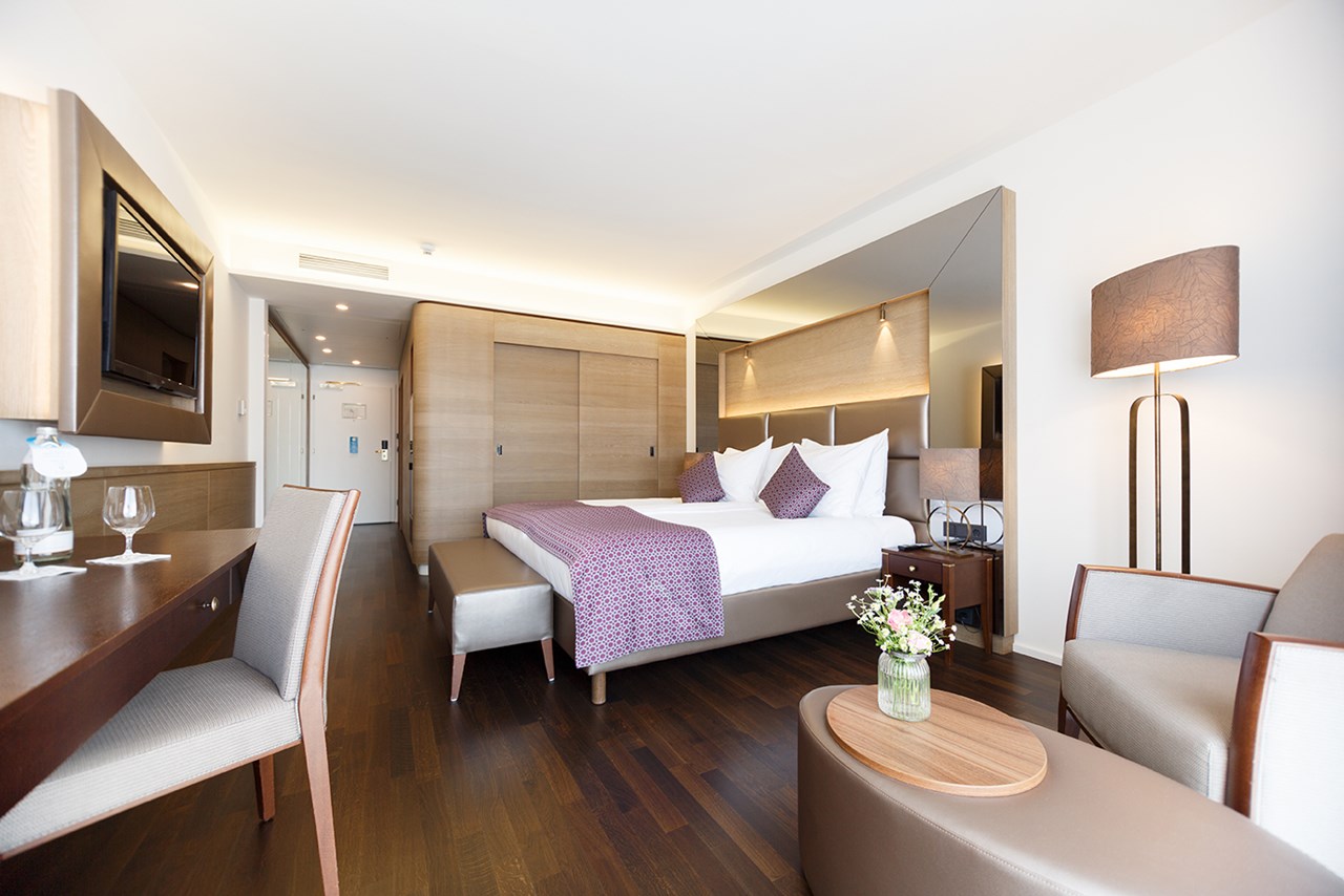 IMLAUER Hotel Pitter Salzburg Zimmerkategorien Deluxe Zimmer Gartenblick