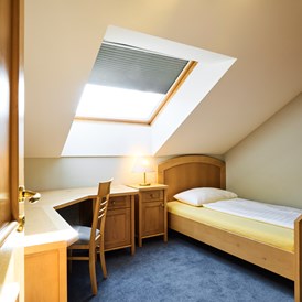 Hotel: Schlafzimmer - Penthouse mit Terrasse - Das Grüne Hotel zur Post - 100% BIO